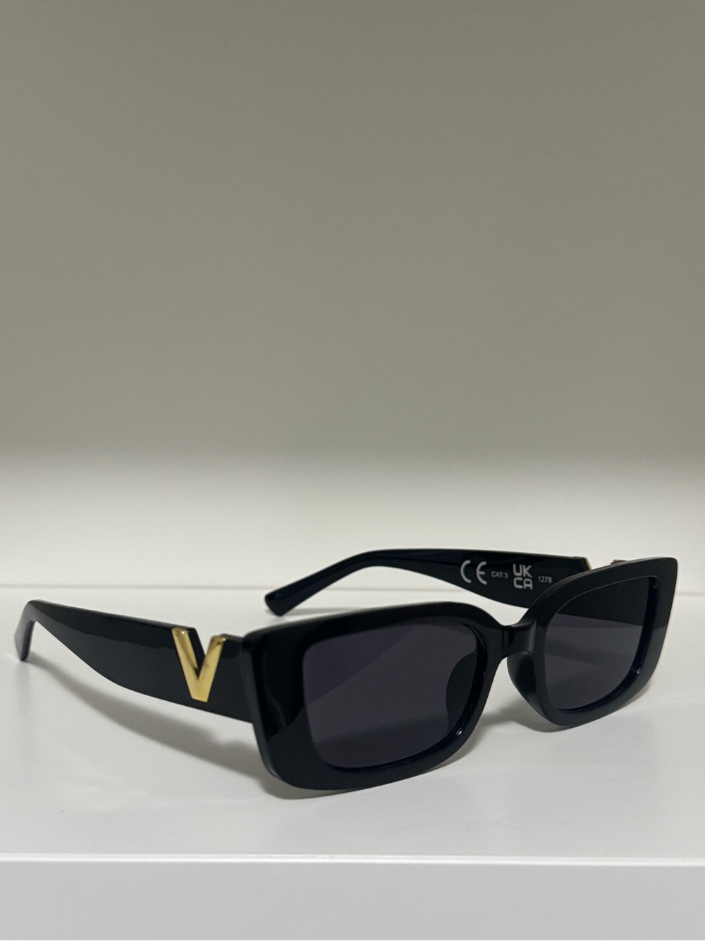 Black Cat-Eye Sunglasses with Gold V Accent - Designer Style